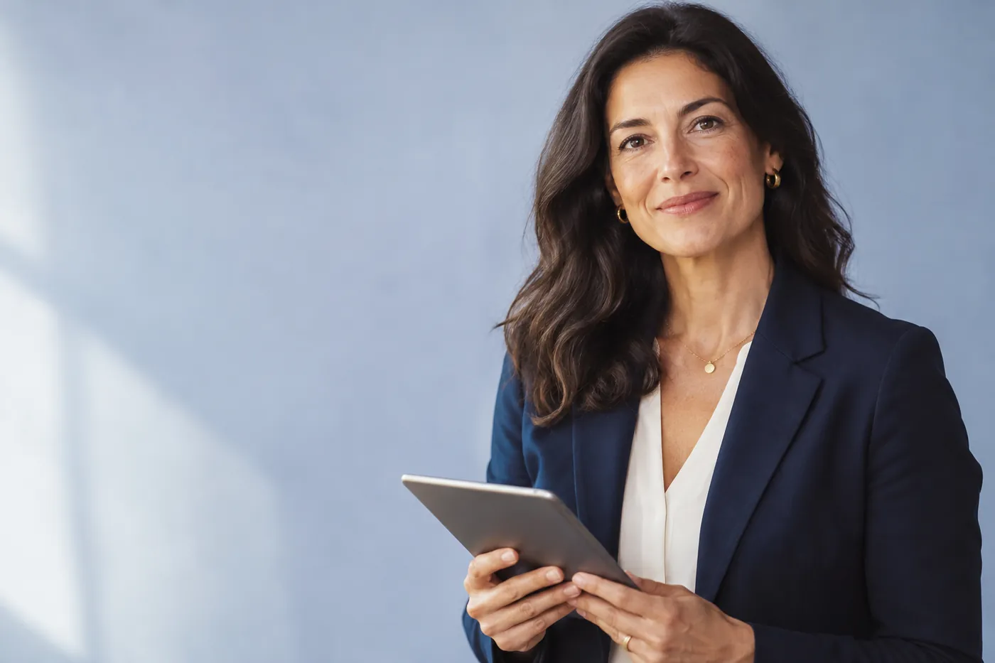 Licensed provider holding a tablet